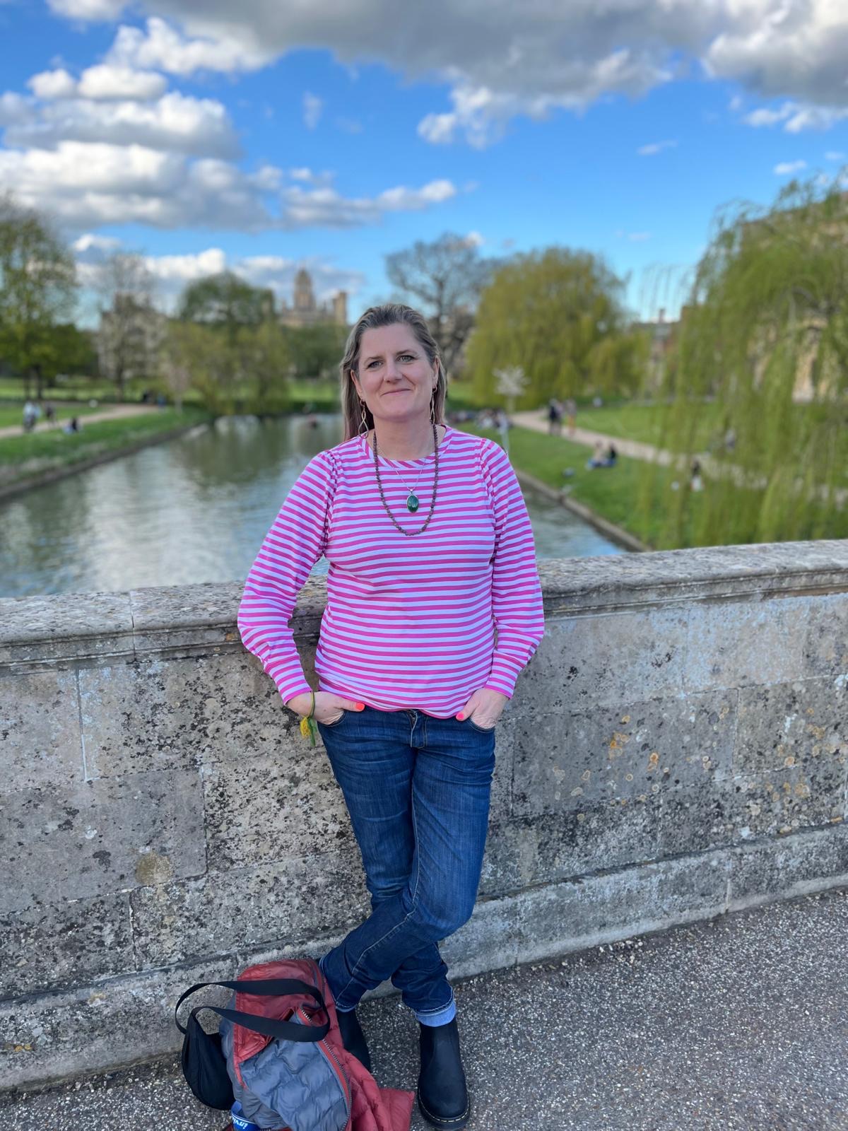 Laura Hamblyn standing on a bridge in Cambridge